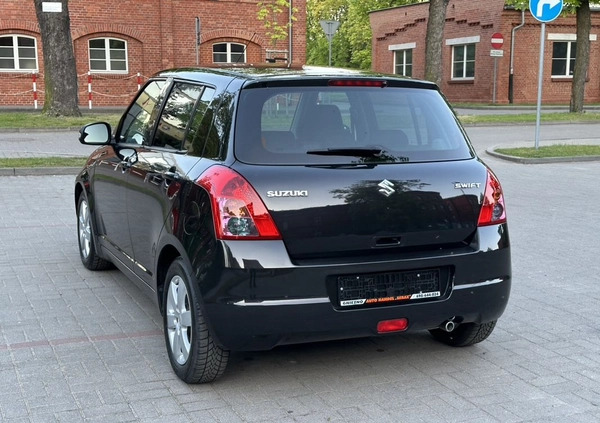Suzuki Swift cena 16900 przebieg: 121000, rok produkcji 2009 z Gniezno małe 497